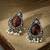 Carved gemstone antique silver earrings