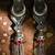 Crimson tassel earrings