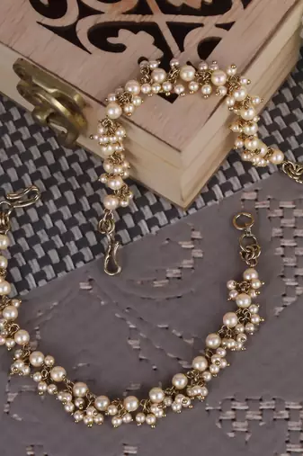 Fascinating golden balls gold plated combo set of 2 ear-chain(kaan chain) for women