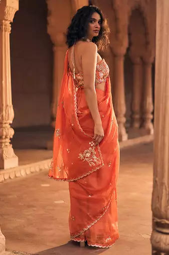 Orange hand embroidered banarasi saree