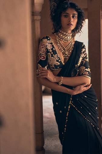Black hand embroidered crepe saree with belt