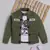 Olive green solid cotton denim jacket with printed t-shirt for boys
