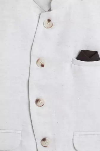 Beige jaquard sleeveless solid waistcoat