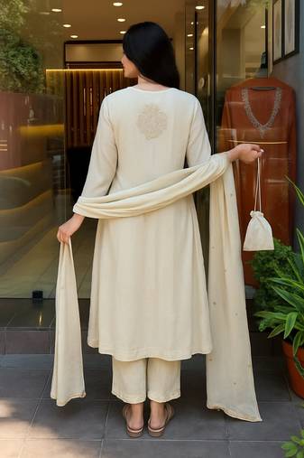 Ethnic festive wear white mull chanderi stitched suit with dupatta