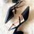 Black solid leather heels