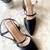 Black solid leather heels
