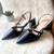 Black solid leather heels