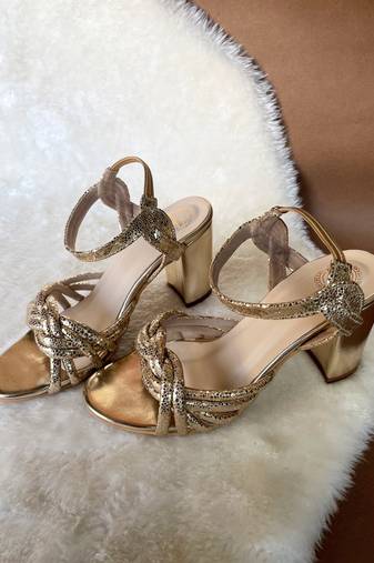 Gold embroidered leather heels