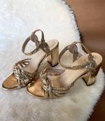 Gold embroidered leather heels