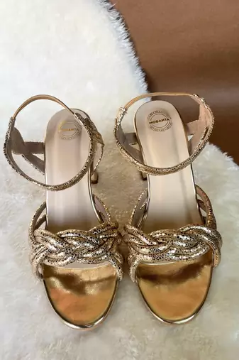 Gold embroidered leather heels