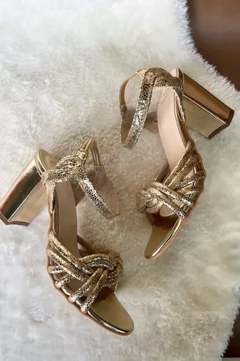 Gold embroidered leather heels