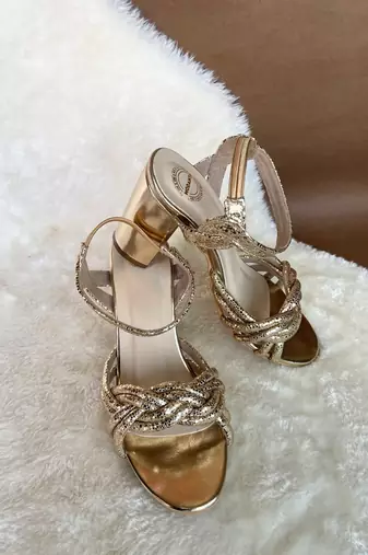 Gold embroidered leather heels