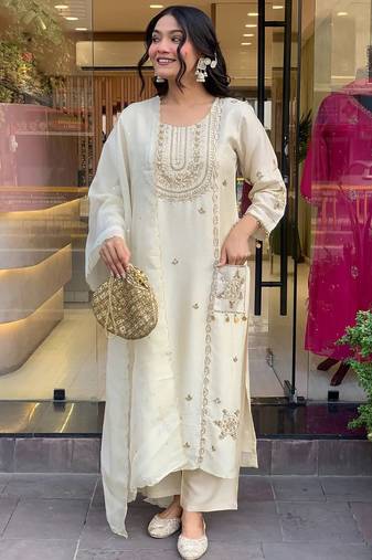 Off white art silk thread embroidered with sequins work kurta pant set