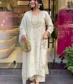 Off white art silk thread embroidered with sequins work kurta pant set