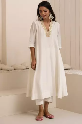 Ivory plain dola silk anarkali set with neckline embroidery