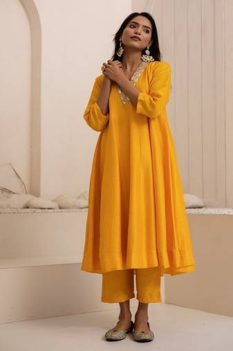 Yellow plain dola silk anarkali set with neckline embroidery