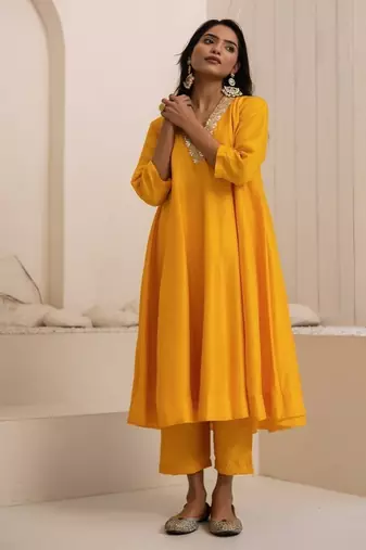 Yellow plain dola silk anarkali set with neckline embroidery