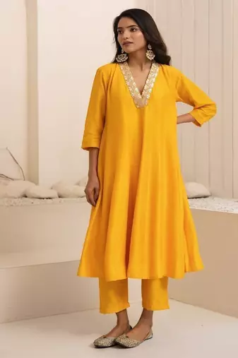 Yellow plain dola silk anarkali set with neckline embroidery
