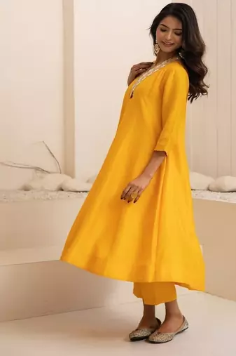 Yellow plain dola silk anarkali set with neckline embroidery