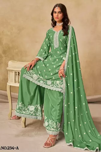 Green heavy chinon palazzo suit with embroidey 