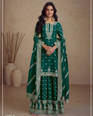 Green heavy vichitra silk suit with sequin & multi  1