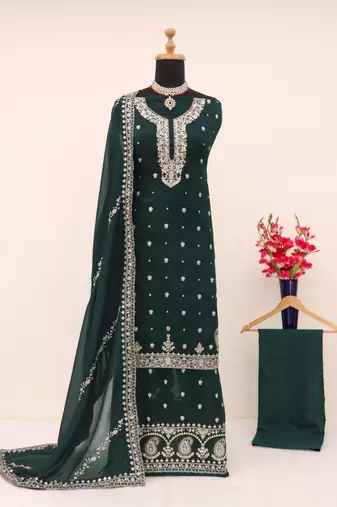 Green heavy vichitra silk suit with sequin & multi 