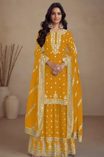 Yellow heavy vichitra silk semi stitched suit with sequence & multi work