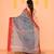 grey cotton blend handloom saree with red temple border