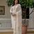 Off white color roman silk fabric graceful festive special kurta set