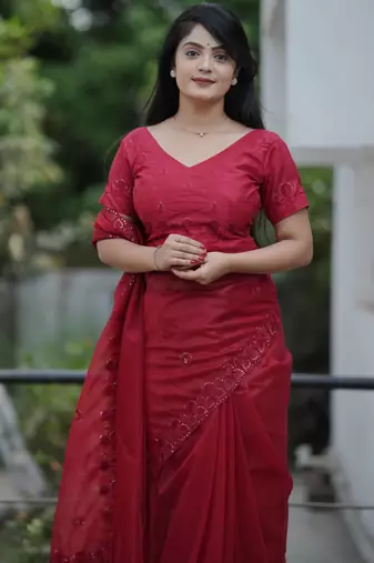 Maroon twill net sequins work ceremonial saree