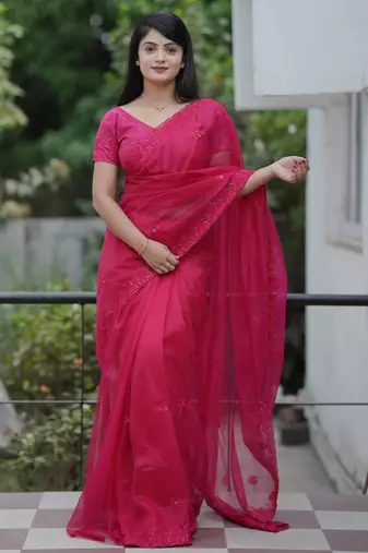 Pink color twill net fabric sequins work ceremonial saree