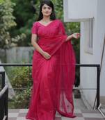Pink color twill net fabric sequins work ceremonial saree