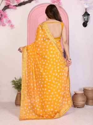 Yellow georgette embroidered partywear saree 2