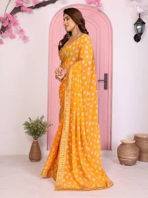 Yellow georgette embroidered partywear saree 4
