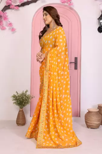 Yellow georgette embroidered partywear saree