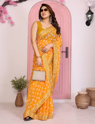 Yellow georgette embroidered partywear saree 5