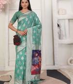 rama green color silk blend fabric ceremonial looks partywear saree