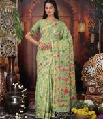 Green color linen cotton fabric woven partywear saree