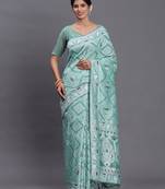 Sea green color beautiful woven linen cotton saree