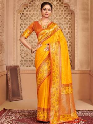 Yellow heavy woven silk blend saree ceremonial looks 1