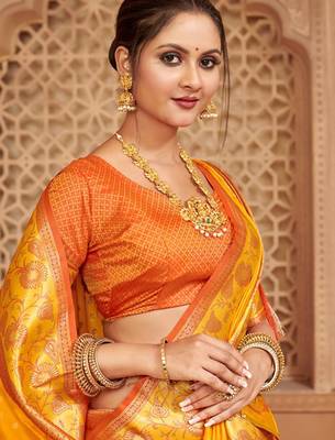 Yellow heavy woven silk blend saree ceremonial looks 2