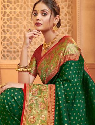 Dark green heavy woven silk blend saree ceremonial looks 2