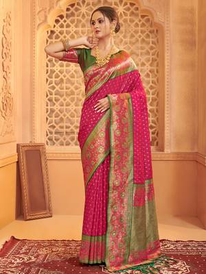 Dark pink heavy woven silk blend saree ceremonial looks 1