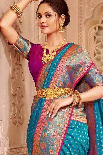 Blue heavy woven silk blend saree ceremonial looks