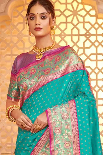 Sea green heavy woven silk blend saree ceremonial looks