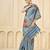 Sky blue color signora jari checks silk fabric floral digital print with foil print graceful ceremonial saree