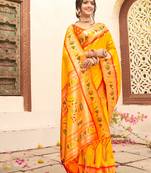 Yellow color silk blended heavy woven designer ethnic partywear saree