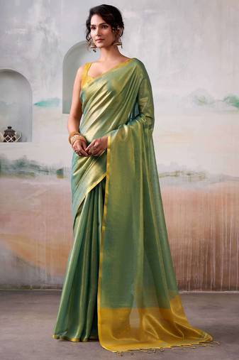 Light green color smart looks tissue silk solid designer saree