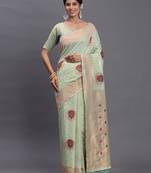 Light green color linen cotton woven festive wear saree