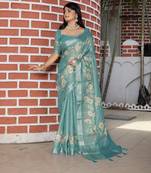 sea green color silk blend fabric smart printed saree with woven border